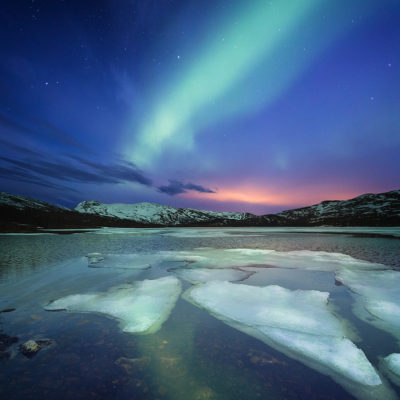 Aurore au-dessus du parc national Skarvan og Roltdalen, Norvège. Photo : Adrian Szatewicz